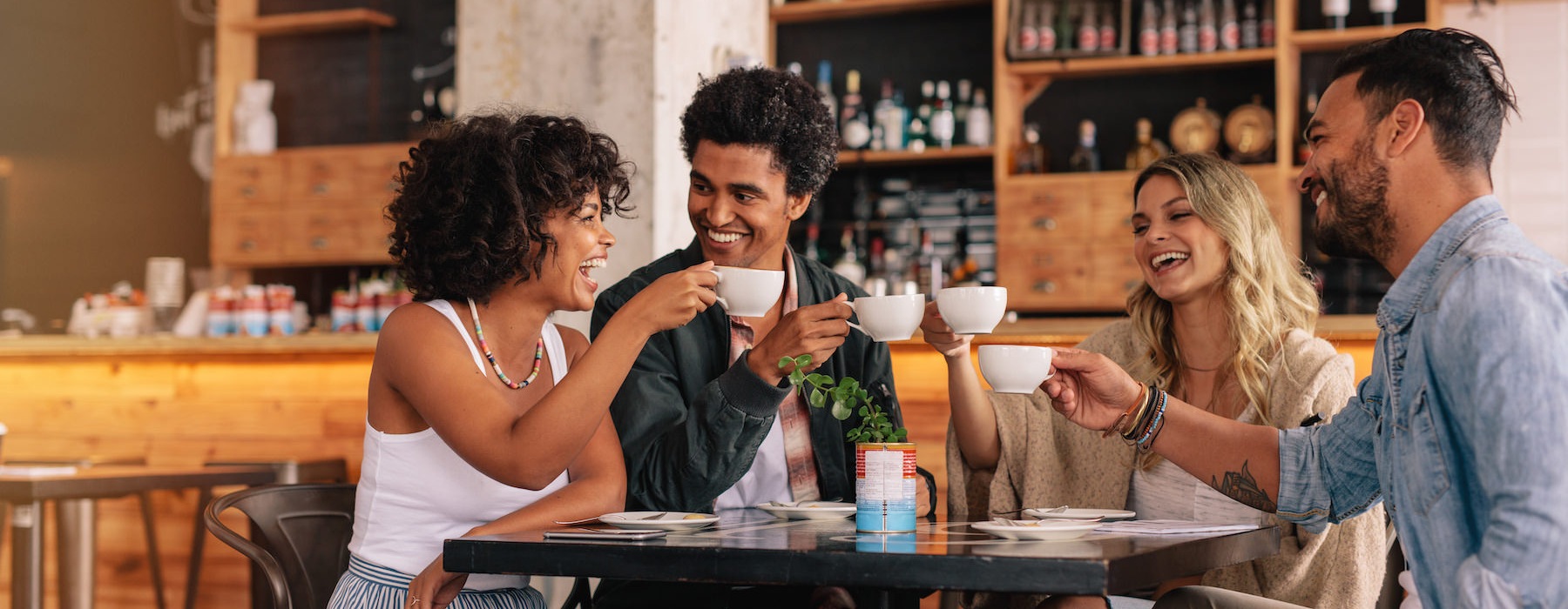 Neighbors sharing coffee in clubhouse
