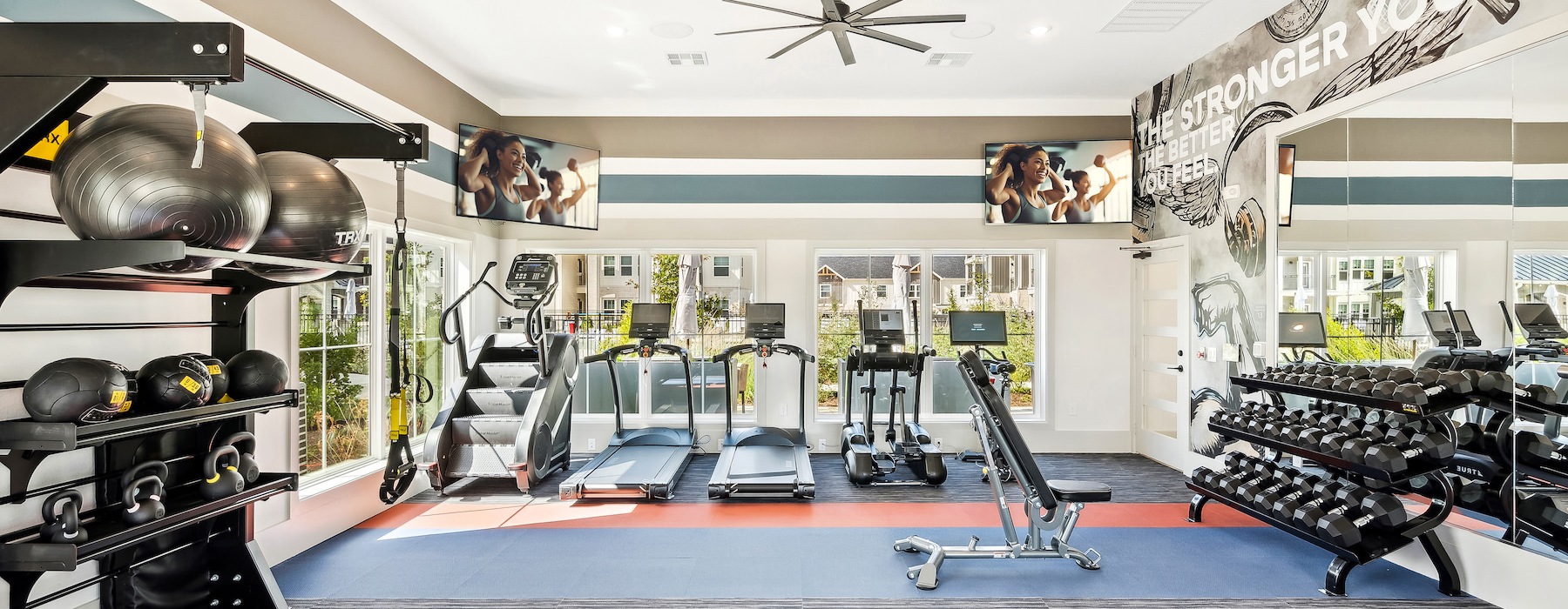 24 hour fitness center with cardio station and free weights